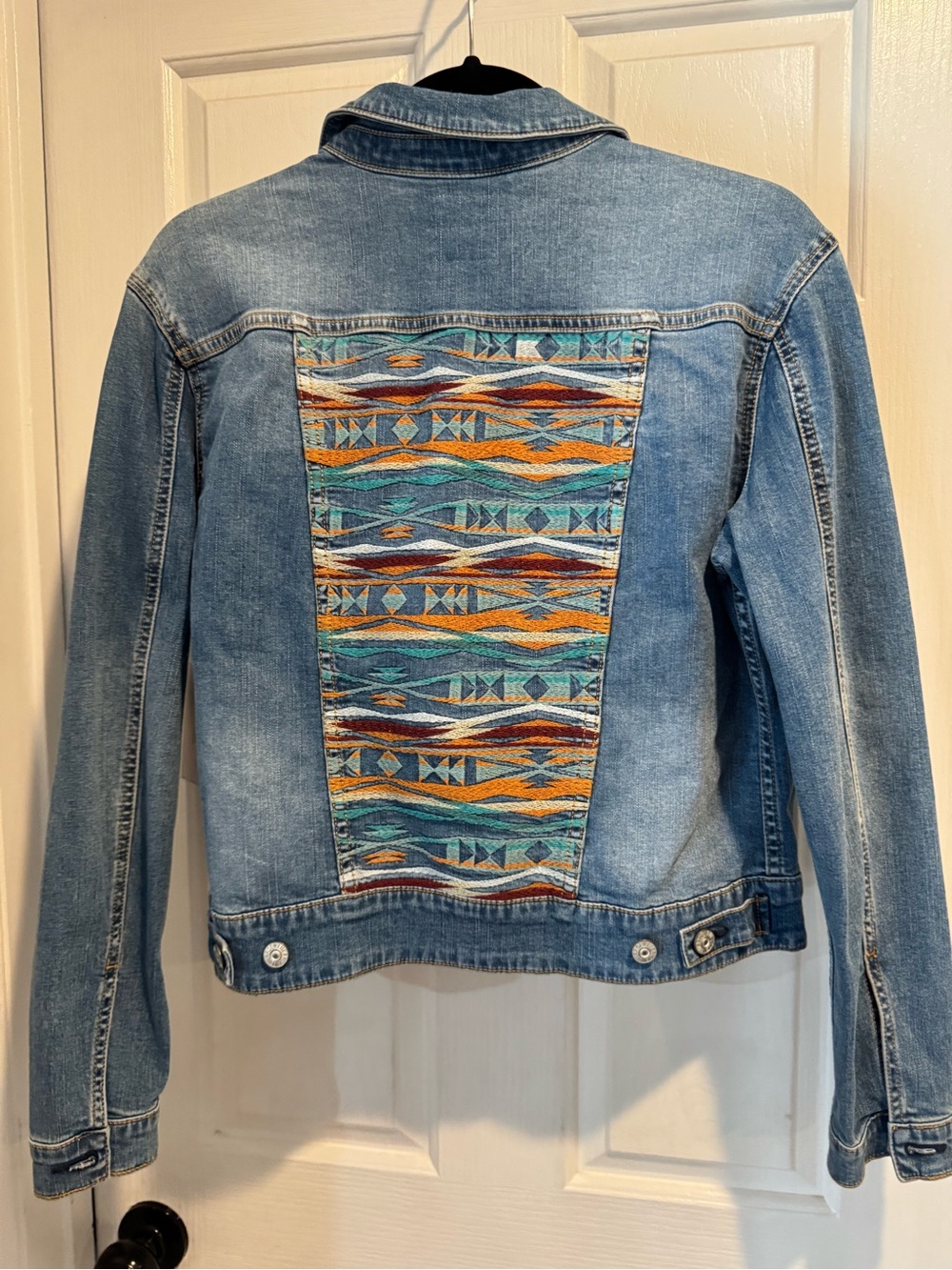 LuLaRoe Light Wash Denim Jacket with embroidered Turquoise & Orange Tribal Panel